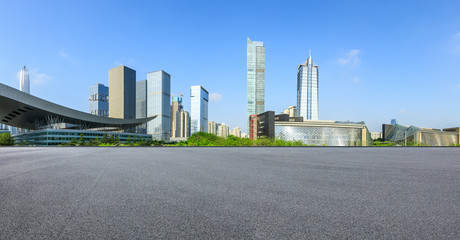 Asphalt road and modern city commercial buildings panorama in Shenzhen