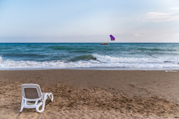 Fototapeta na wymiar water sports, sun bed on the background of the sea