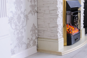 hot white fireplace in the apartment