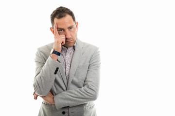 Fototapeta premium Portrait of business man showing thinking gesture