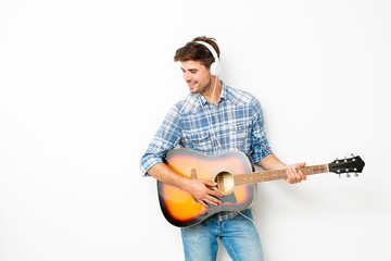 man playing guitar on white background