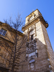 Aix-en-Provence, FRANCE, on March 8, 2018. Urban view. A picturesque old tower with a chiming clock