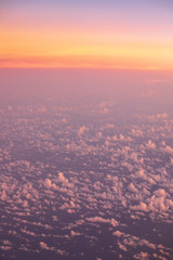 Fototapeta na wymiar Colorful sky during sunset, view from airplane