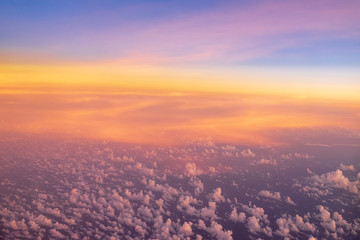 Colorful sky during sunset, view from airplane
