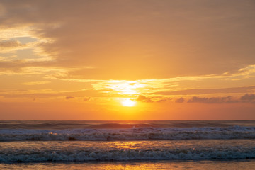 Beautiful golden sunrise at the sea