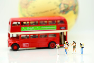 Miniature people : Traveler backpacking Calling Taxi with tourist bus,Travel concept.
