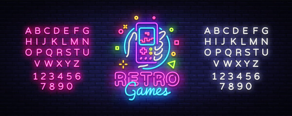 Retro Games Vector Logo. Retro geek gaming gamepad in hand neon sign, modern trend design, vivid vector illustration, promotional character games. Vector Illustration. Editing text neon sign - obrazy, fototapety, plakaty