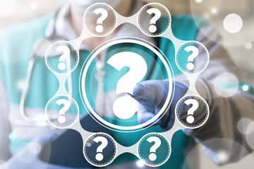 Doctor clicks a question mark on a virtual medical informative panel. Healthcare questions faq...