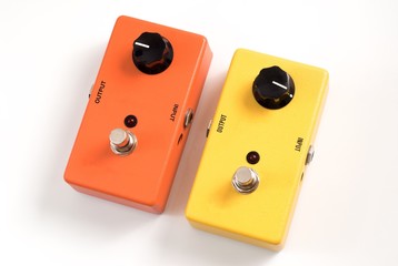 Yellow and orange guitar stompboxes