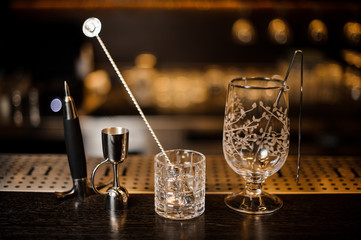 Set of essential barman equipment on the bar counter