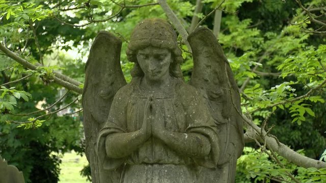 Angel on a cemetery - close up (Praying)