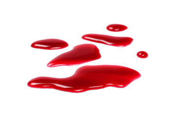 Bilberry and chokeberry, currant juice puddle isolated on white background