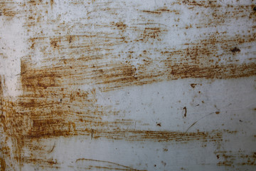 White tin background with rust scratches. Old vintage texture.