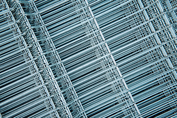 Brilliant polished metal wire mesh, folded into a flat leaf, poured into cold metallic shades.