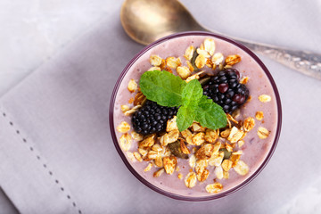 Blackberry smoothie with granola
