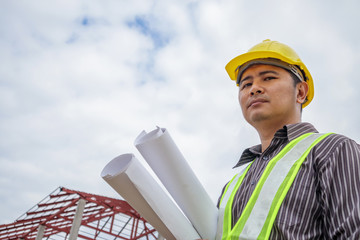 Asian business man construction engineer worker at house building site