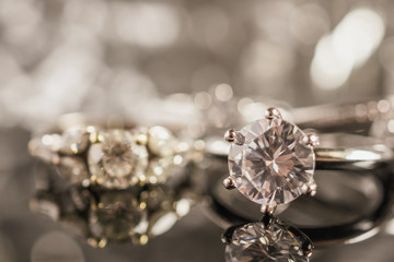 Luxury Jewelry diamond rings with reflection on black background