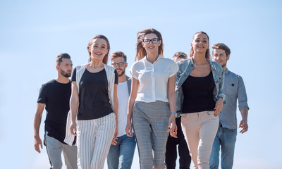 group of young people, confidently stepping forward