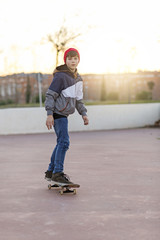 Young man riding on a skate in the city street