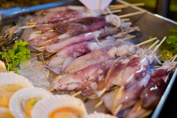 Thai raw squid barbecue skewer