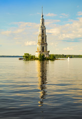 Fototapeta na wymiar Flooded bell tower in Kalyazin - the main landmark of the city, Tver region, Russia