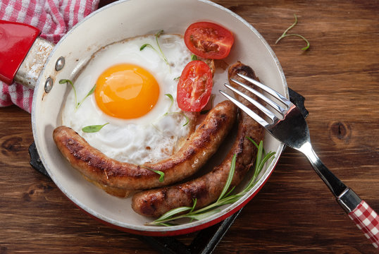 Fried eggs sausages