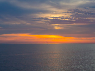 Fototapeta na wymiar Beautiful sunset in Adriatic sea, Montenegro, captured from a sailing boat