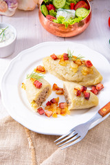 Rustic Cepelinai, a specialty Lithuanian and Polish cuisine.