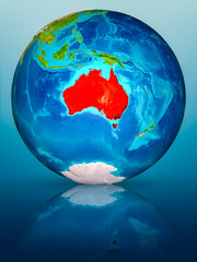 Australia on Earth on reflective surface