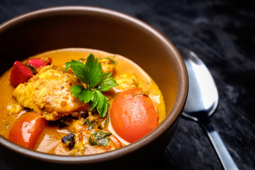 Fish curry in ceramic bowl