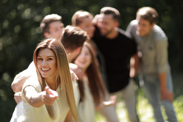 modern girl pointing at you.
