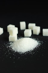 sugar on black background