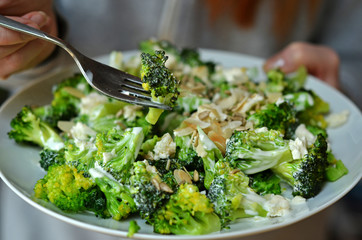 Broccoli salad on a white plate