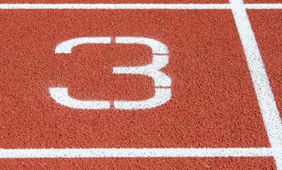 Laufbahnmarkierung auf einer Leichtathletikbahn