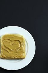 slice of fresh bread with peanut butter