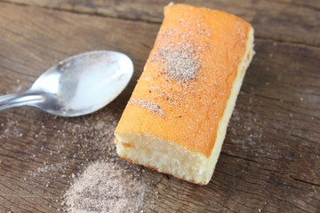 fresh sweet homemade delicious cake on wooden background
