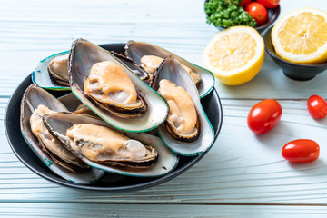 fresh mussel on bowl