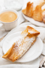 portuguese sweet dessert with cup of coffee