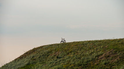 Naklejka na ściany i meble bike for walks on the hillside.