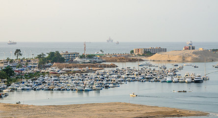 Luanda Yacht Club or Clube Naval de Luanda with many boats at Luanda Bay in the capital of Angola,...