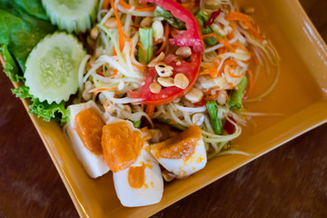 Thai salted egg papaya salad
