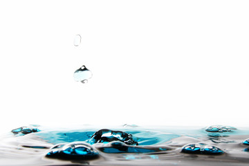 Water droplet as background / Water is a transparent, tasteless, odorless, and nearly colorless...