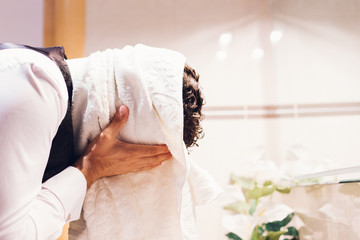 Businessman drying his head with a towel