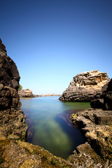 A Rocky Area By The Sea