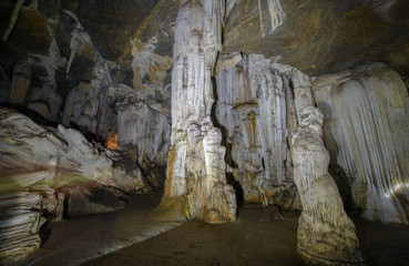 Fototapeta na wymiar Stalactites and stalagmites in Tham Phu Wai, Cave in Thailand