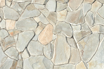 Wall of natural gray stone. Close up