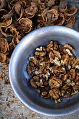 Walnuts kernels with color background, Whole walnut in a metal plate. Walnuts. Walnuts an market. Background of walnuts. Healthy. Fresh