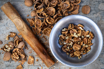 Walnuts kernels with color background, Whole walnut in a metal plate. Walnuts. Walnuts an market. Background of walnuts. Healthy. Fresh