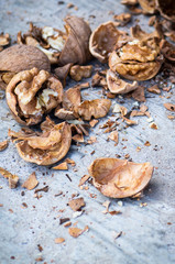 Walnuts kernels with color background, Whole walnut in a metal plate. Walnuts. Walnuts an market. Background of walnuts. Healthy. Fresh