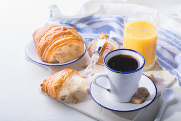 Croissant with Jam Espresso Coffee and a glass of Orange Juice Tradition of the Sunset Morning Baking Sweet Dessert